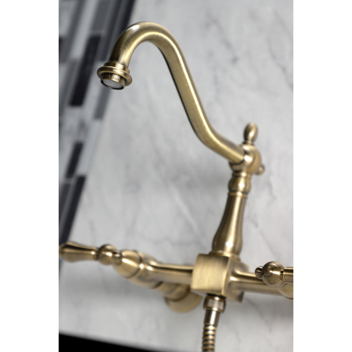 Heritage KS1243ALBS Two-Handle 2-Hole Wall Mount Bridge Kitchen Faucet with Brass Sprayer, Antique Brass