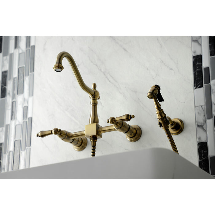 Heritage KS1243ALBS Two-Handle 2-Hole Wall Mount Bridge Kitchen Faucet with Brass Sprayer, Antique Brass