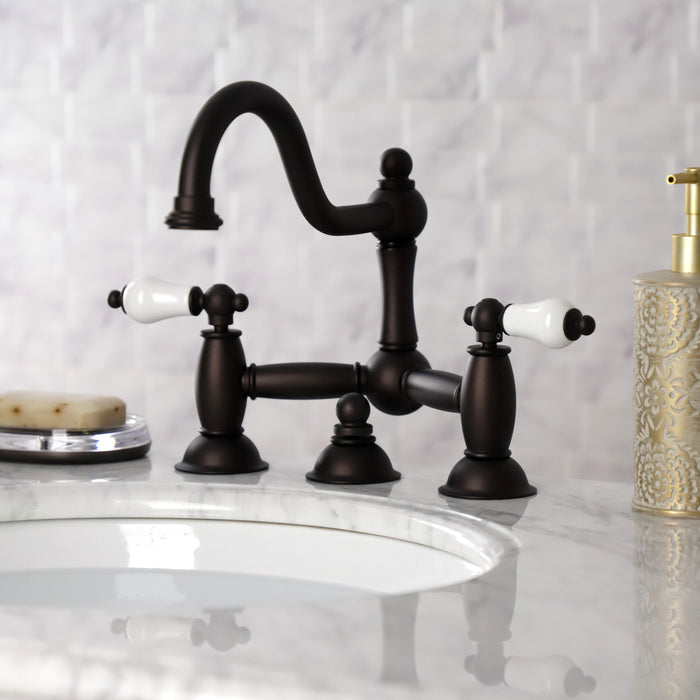 Restoration KS3915PL Two-Handle 3-Hole Deck Mount Bridge Bathroom Faucet with Brass Pop-Up, Oil Rubbed Bronze