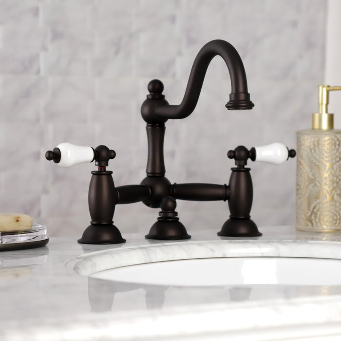 Restoration KS3915PL Two-Handle 3-Hole Deck Mount Bridge Bathroom Faucet with Brass Pop-Up, Oil Rubbed Bronze