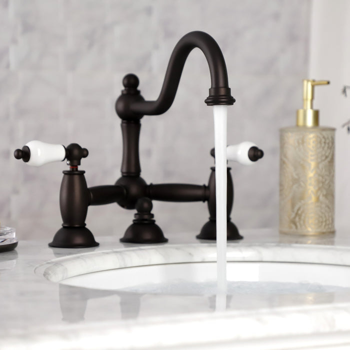 Restoration KS3915PL Two-Handle 3-Hole Deck Mount Bridge Bathroom Faucet with Brass Pop-Up, Oil Rubbed Bronze