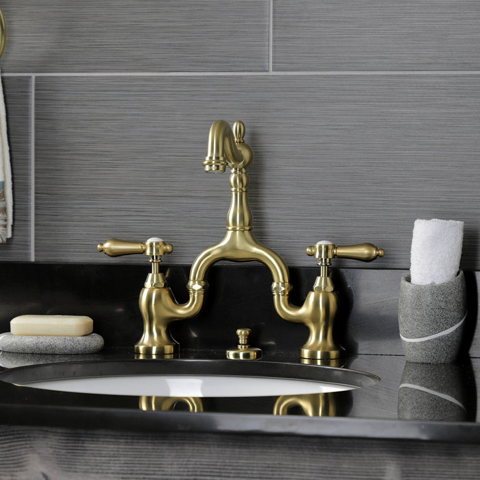 Heirloom KS7977BAL Two-Handle 3-Hole Deck Mount Bridge Bathroom Faucet with Brass Pop-Up, Brushed Brass